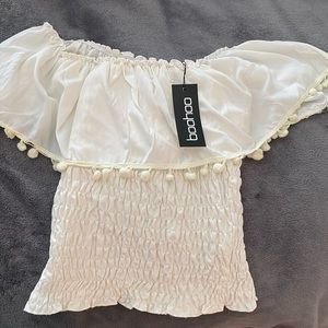 Boohoo pompom off the shoulder shirt
